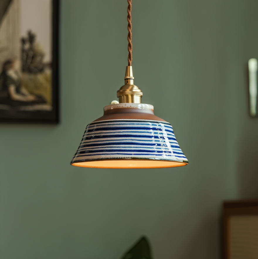 Ronja hand-painted blue floral ceramic pendant light hanging above a kitchen dining nook