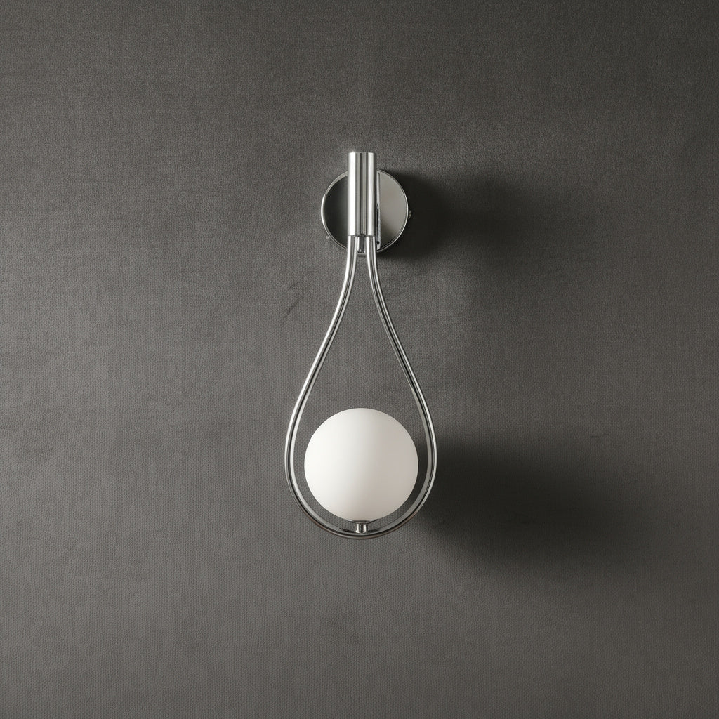 Livi gold Nordic wall sconce mounted beside a bed in a minimalist bedroom