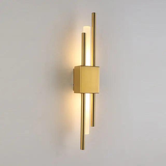 Adan matte black articulated metal wall lamp mounted in a bedroom beside a headboard