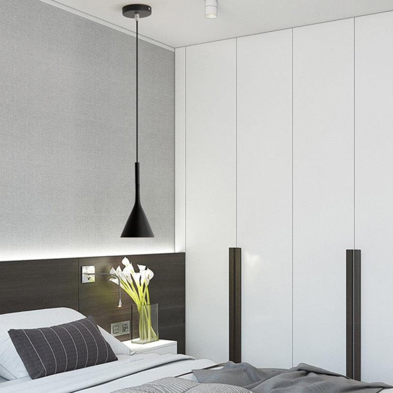 Moderna black aluminium Nordic pendant light with adjustable cord above a kitchen island