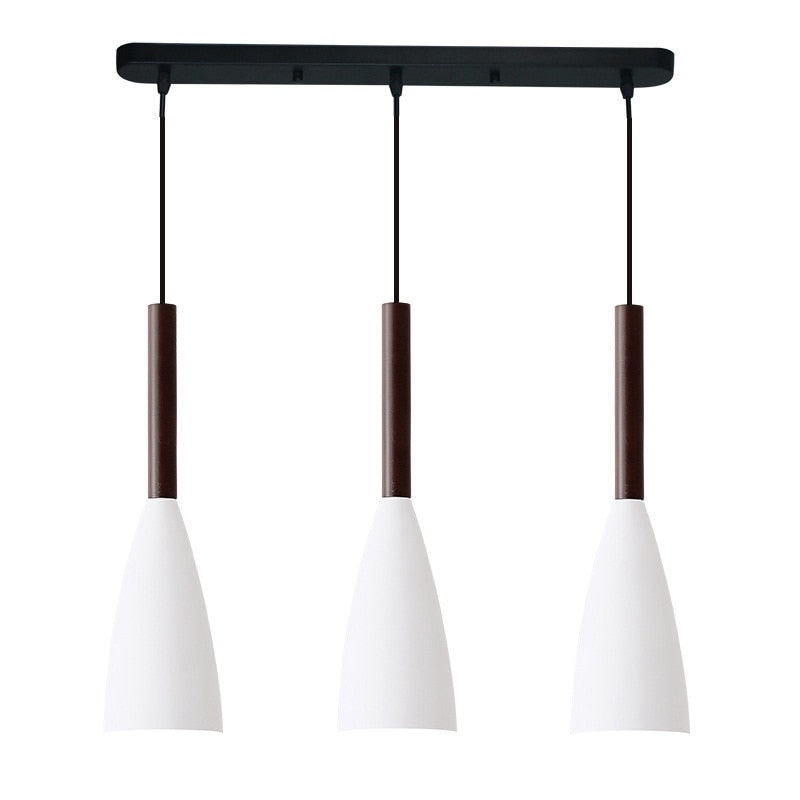 Trine triple aluminium pendant light in white above a kitchen island with adjustable cord lengths