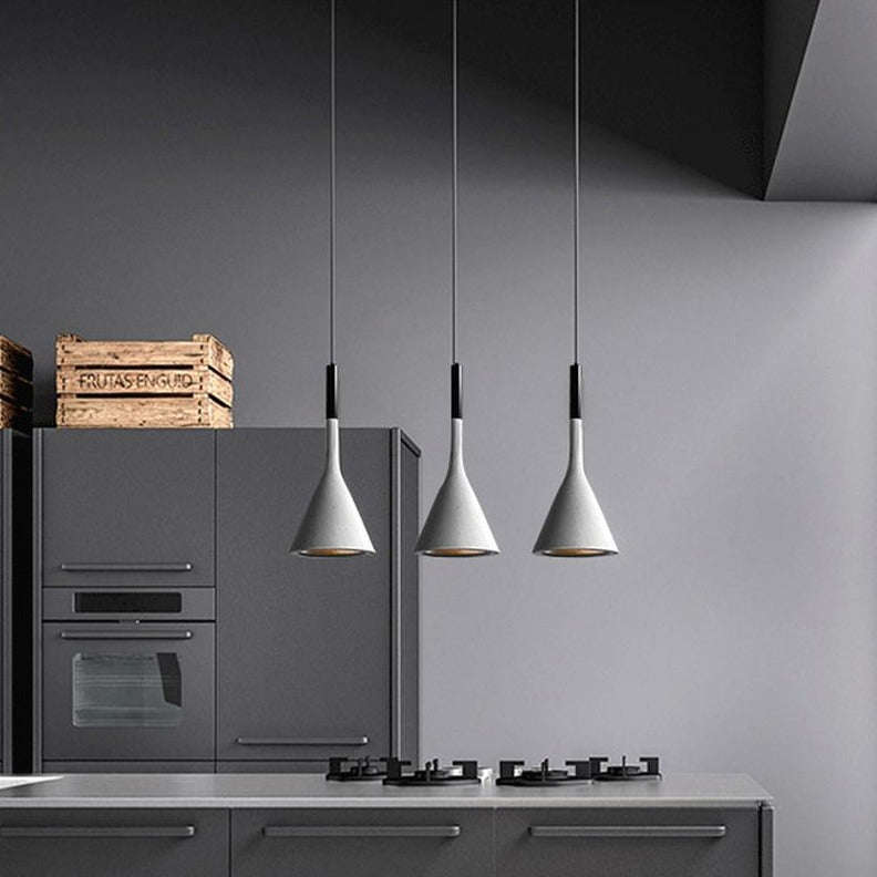 Moderna black aluminium Nordic pendant light with adjustable cord above a kitchen island
