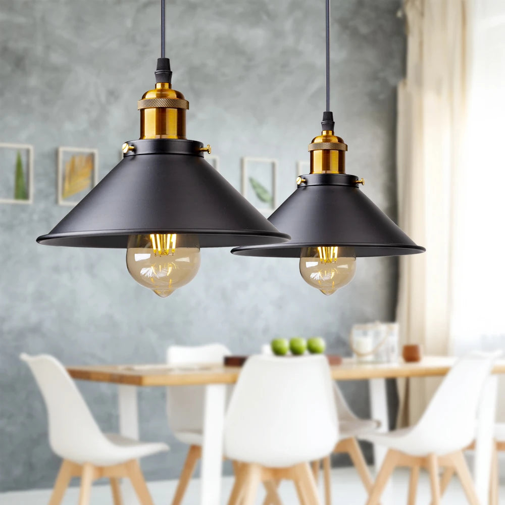 Camden vintage loft pendant light in black metal finish hanging above a kitchen dining table