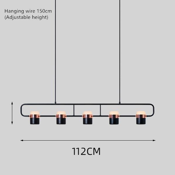 La Scène 3-head Nordic LED chandelier in white hanging above a kitchen island