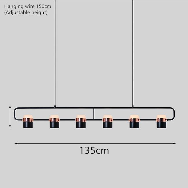 La Scène 3-head Nordic LED chandelier in white hanging above a kitchen island
