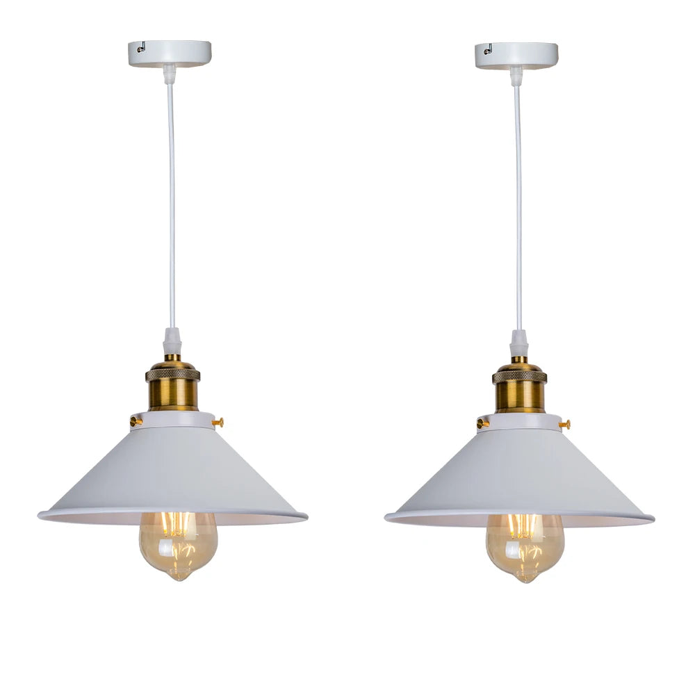 Camden vintage loft pendant light in black metal finish hanging above a kitchen dining table