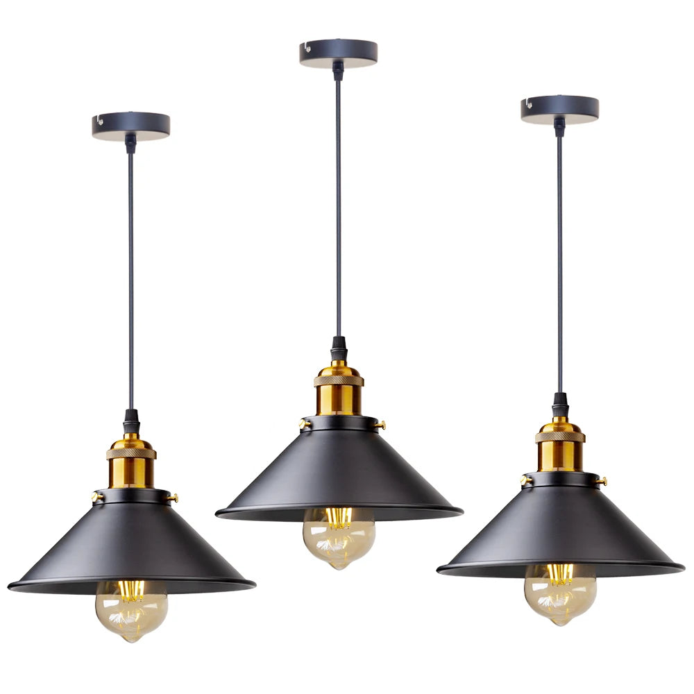 Camden vintage loft pendant light in black metal finish hanging above a kitchen dining table