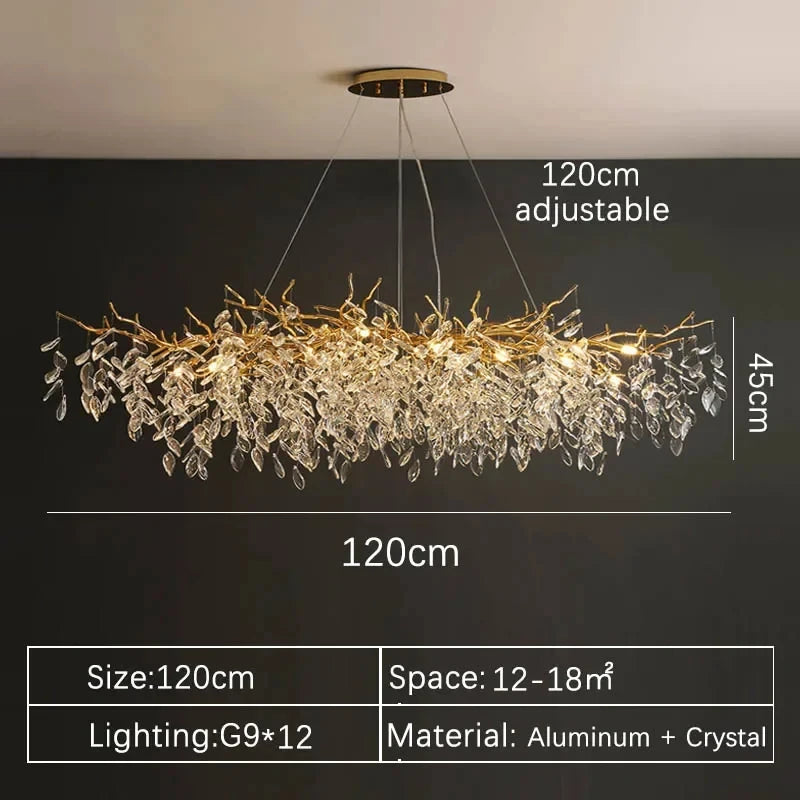 Aurelius brushed gold crystal LED chandelier hanging in a formal dining room