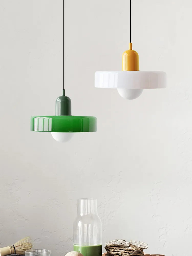 Kalle beige and white Bauhaus dual-tone glass pendant light hanging above a dining table