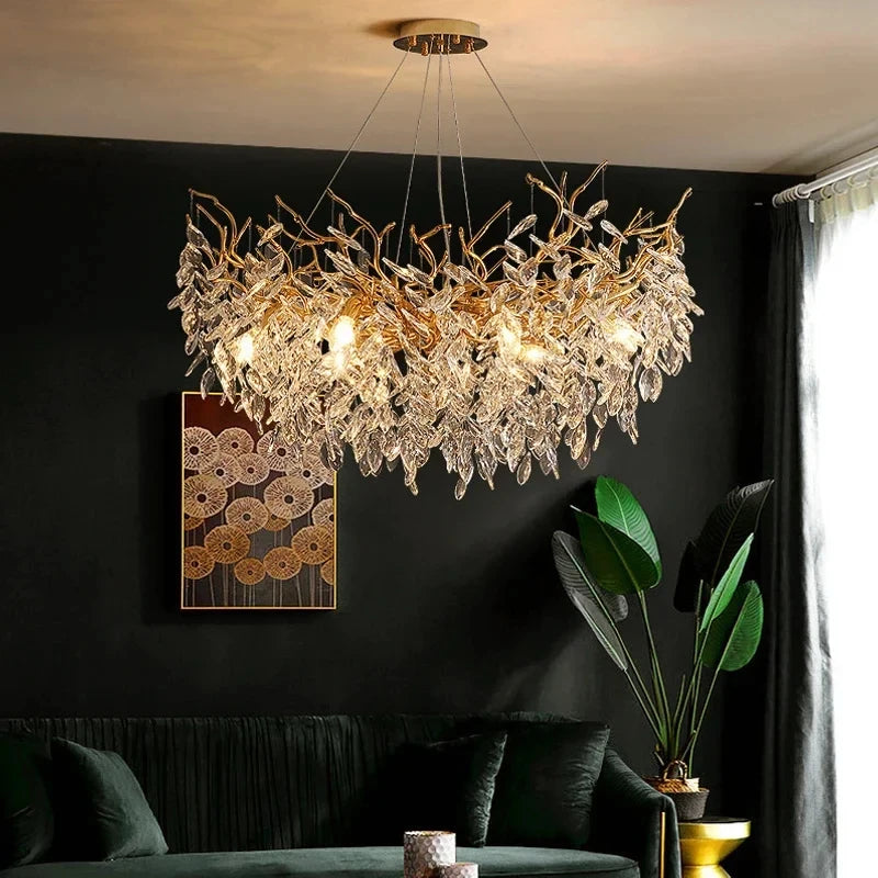 Aurelius brushed gold crystal LED chandelier hanging in a formal dining room