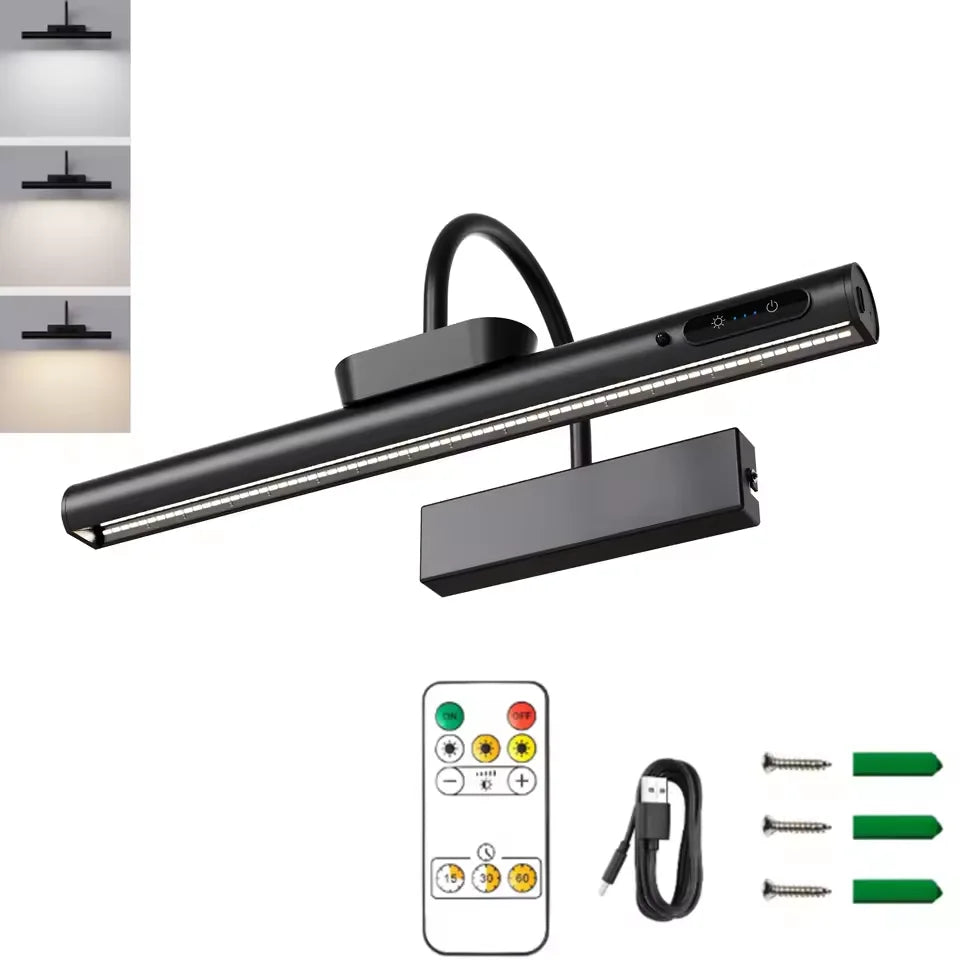 Gallery rechargeable picture light mounted above a framed painting in a living room