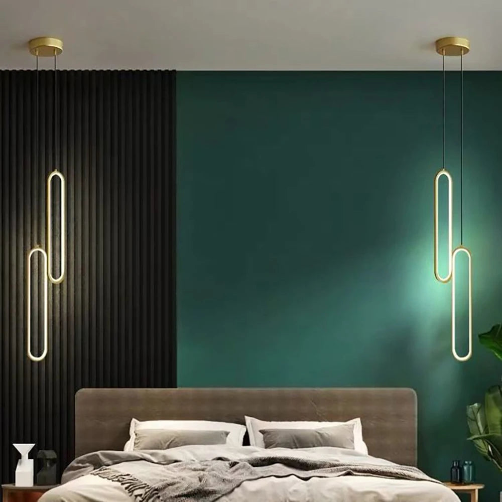 Arlo minimalist aluminium bar pendant light in matte black, hanging above a kitchen island