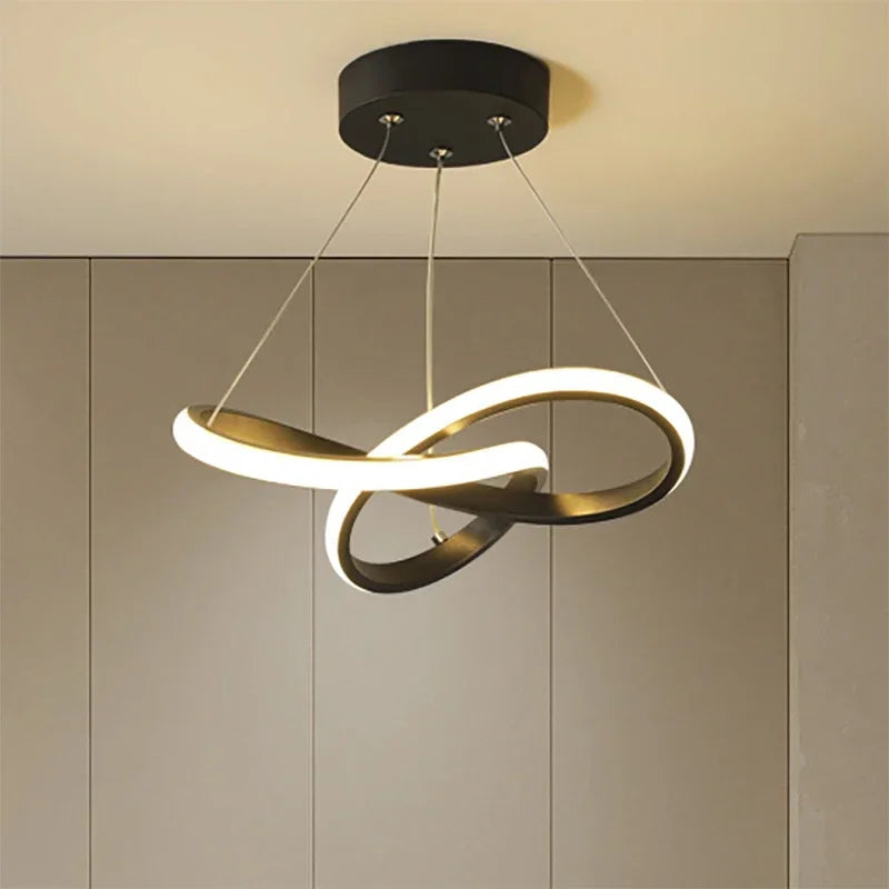Strand slim Nordic LED ceiling pendant in white hanging in a dining room with low ceiling