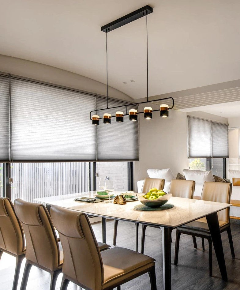 La Scène 3-head Nordic LED chandelier in white hanging above a kitchen island