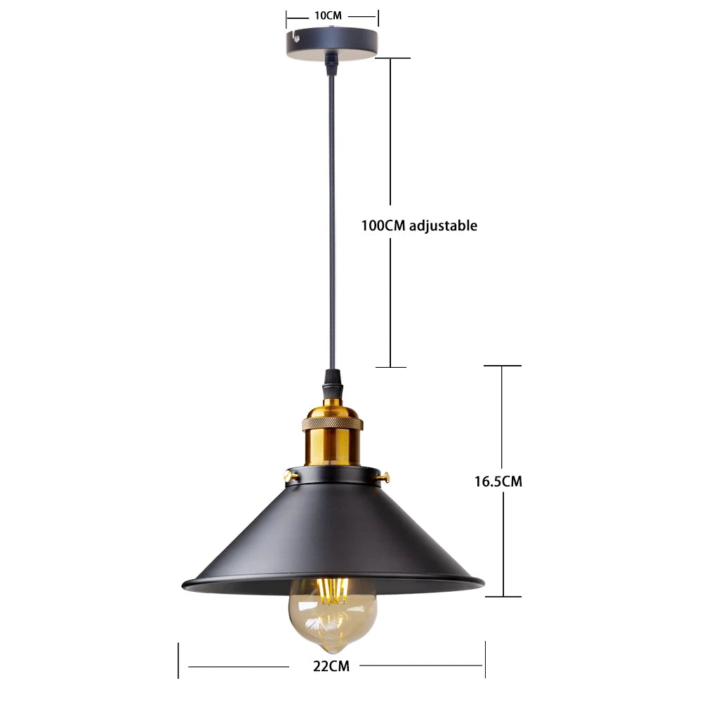 Camden vintage loft pendant light in black metal finish hanging above a kitchen dining table