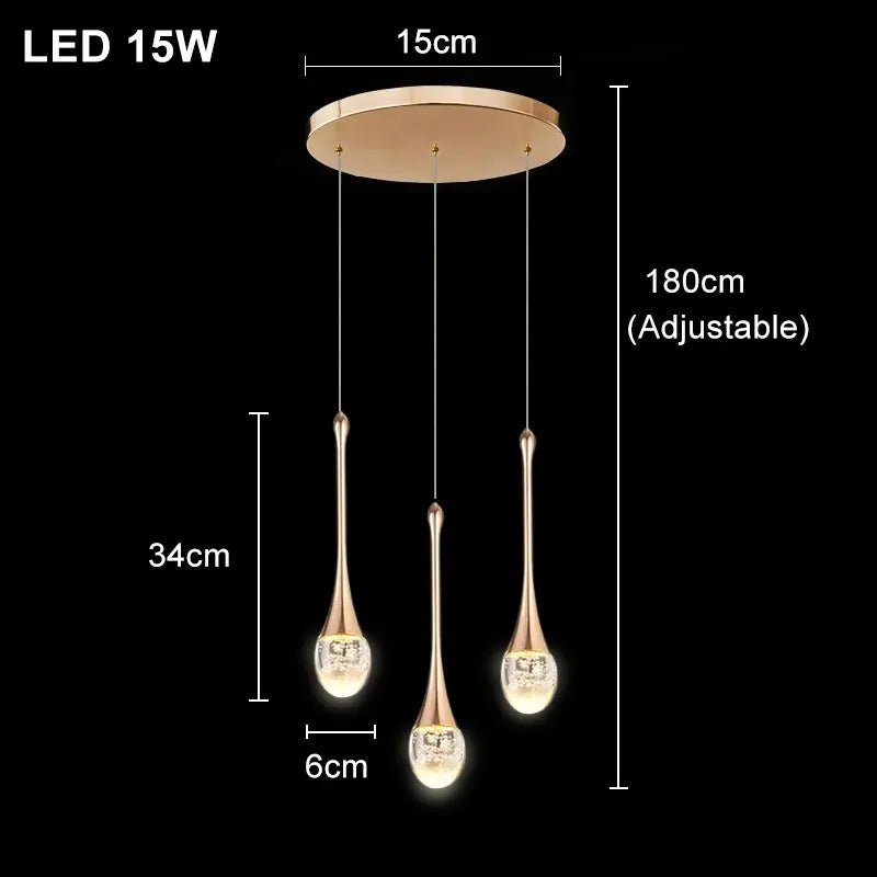 Dewdrop crystal cluster pendant light with multiple glass spheres hanging above a dining table