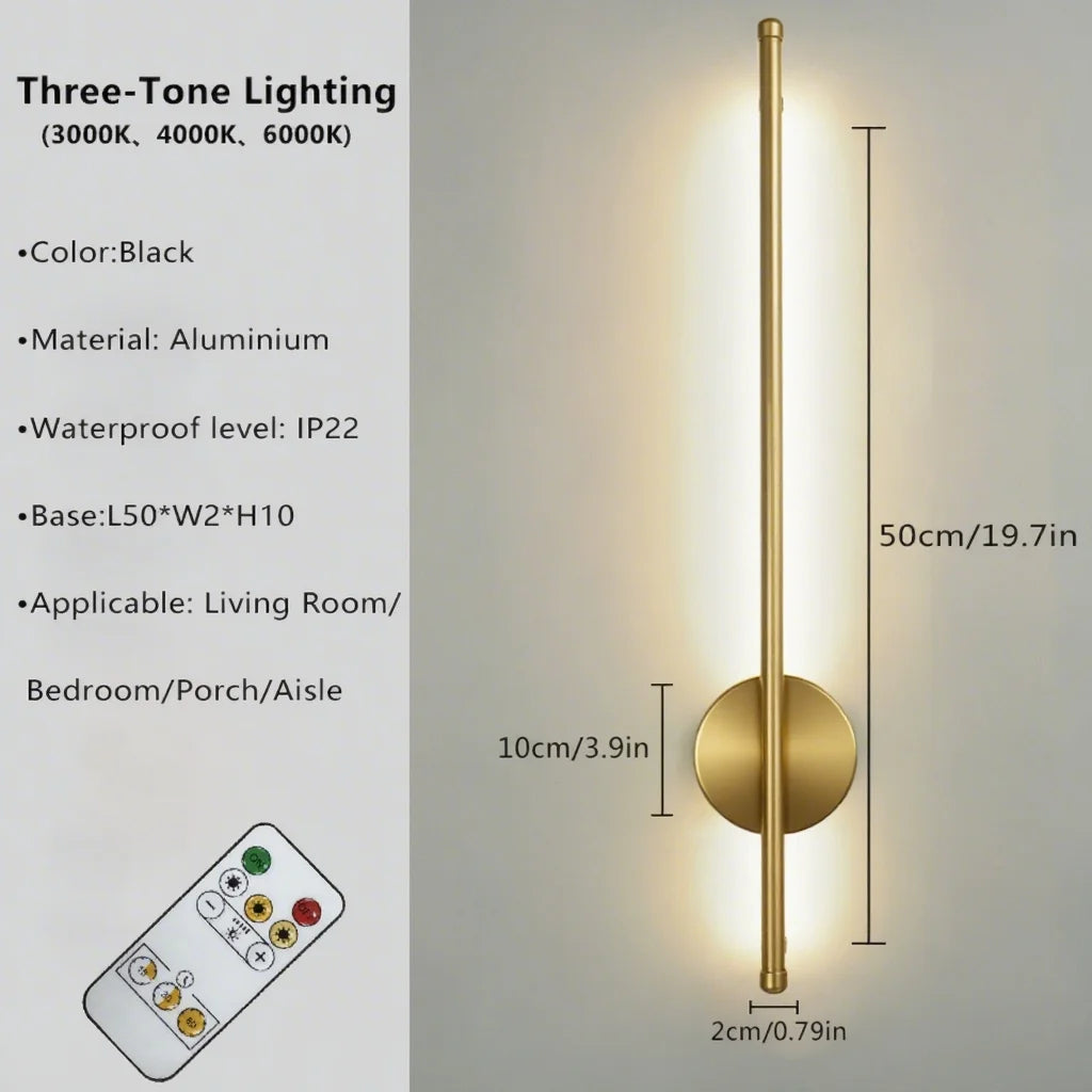 Volta magnetic rechargeable wall lamp in gold mounted in a hallway