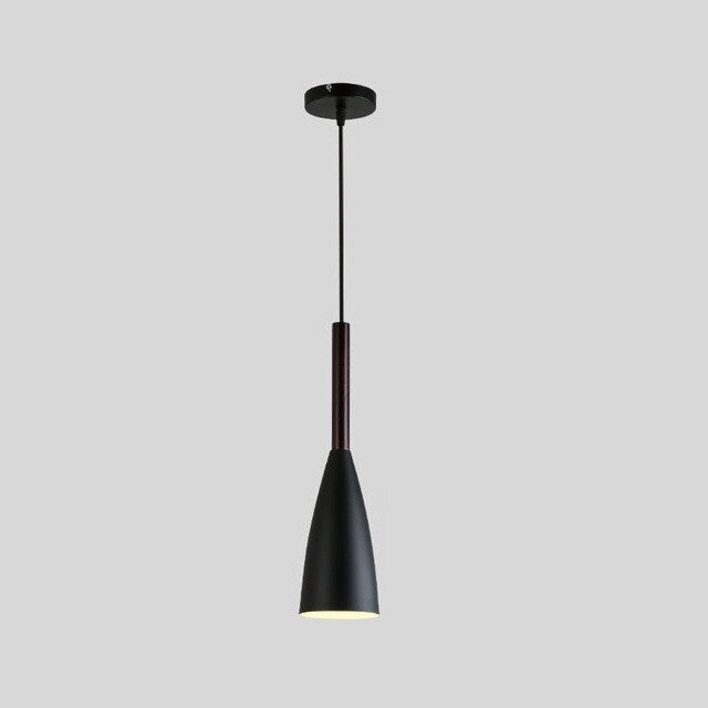 Trine triple aluminium pendant light in white above a kitchen island with adjustable cord lengths