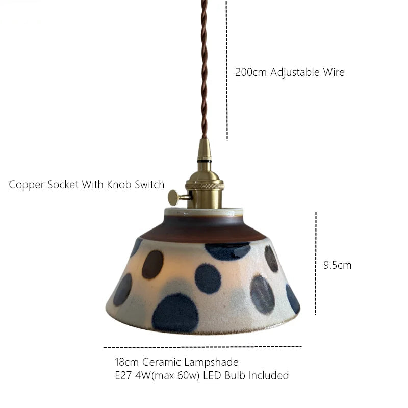 Ronja hand-painted blue floral ceramic pendant light hanging above a kitchen dining nook