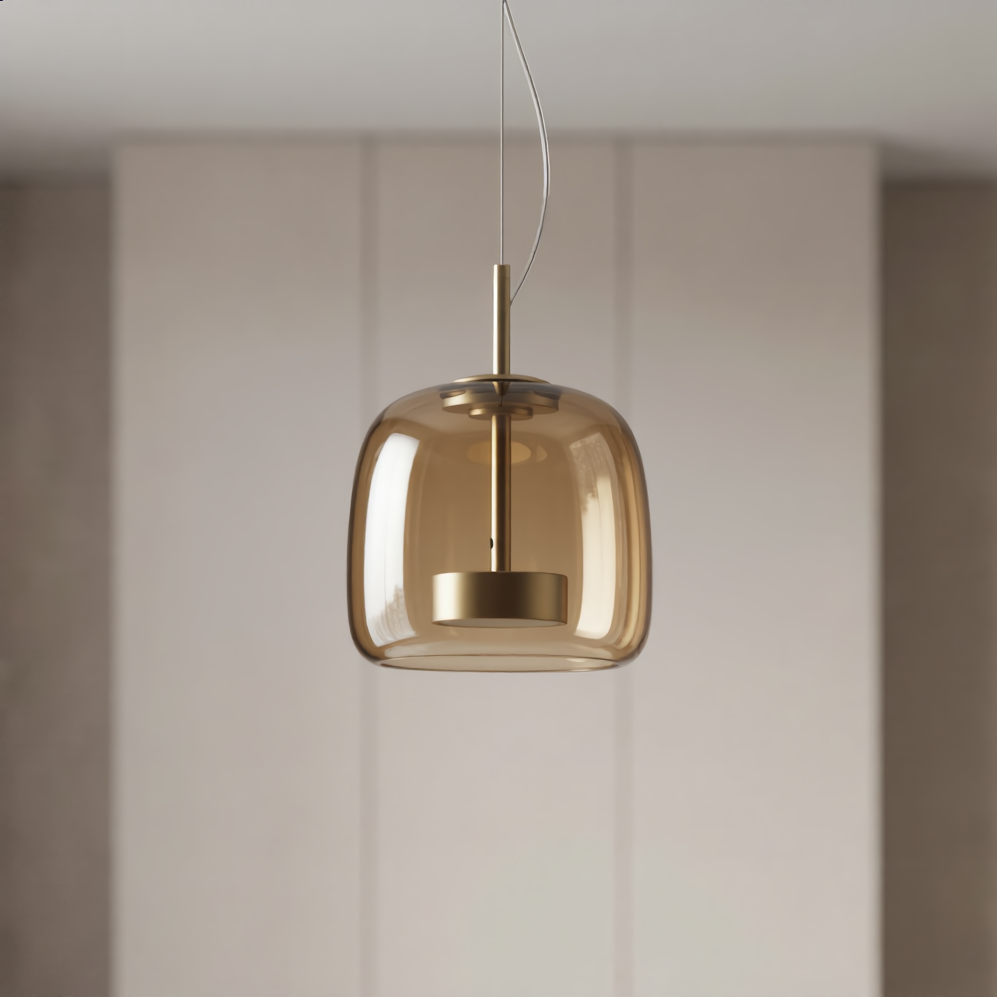 Astrid amber glass Nordic pendant light with gold fitting above a dining table
