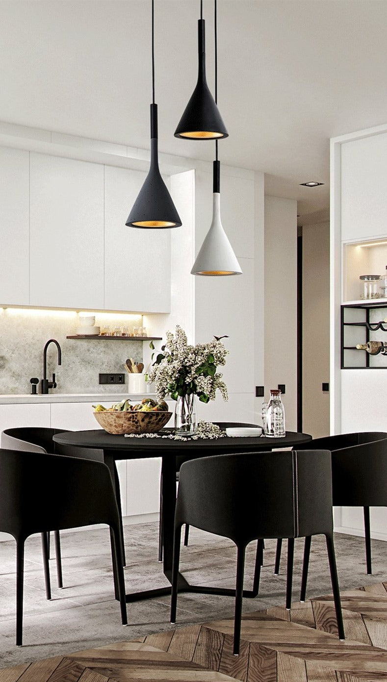 Moderna black aluminium Nordic pendant light with adjustable cord above a kitchen island
