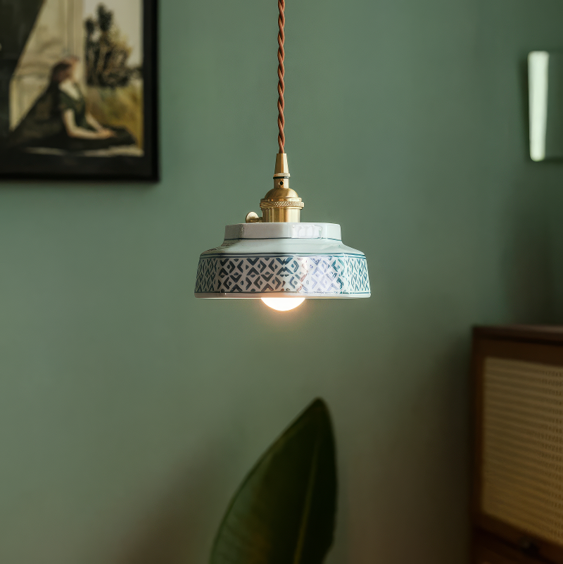 Sonja burnt clay hand-painted ceramic pendant light above a kitchen island