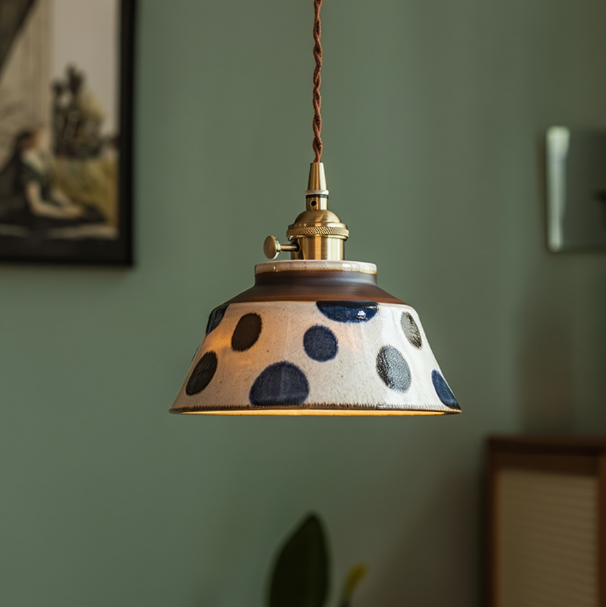 Ronja hand-painted blue floral ceramic pendant light hanging above a kitchen dining nook