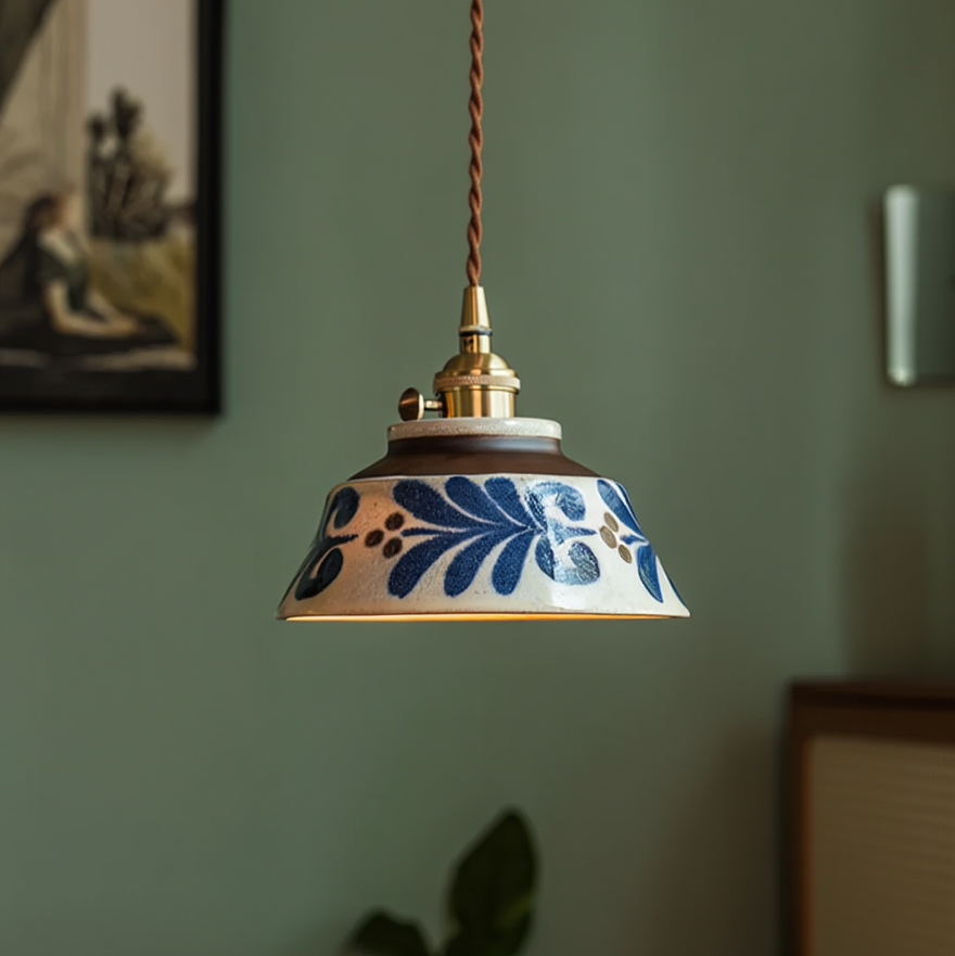 Ronja hand-painted blue floral ceramic pendant light hanging above a kitchen dining nook