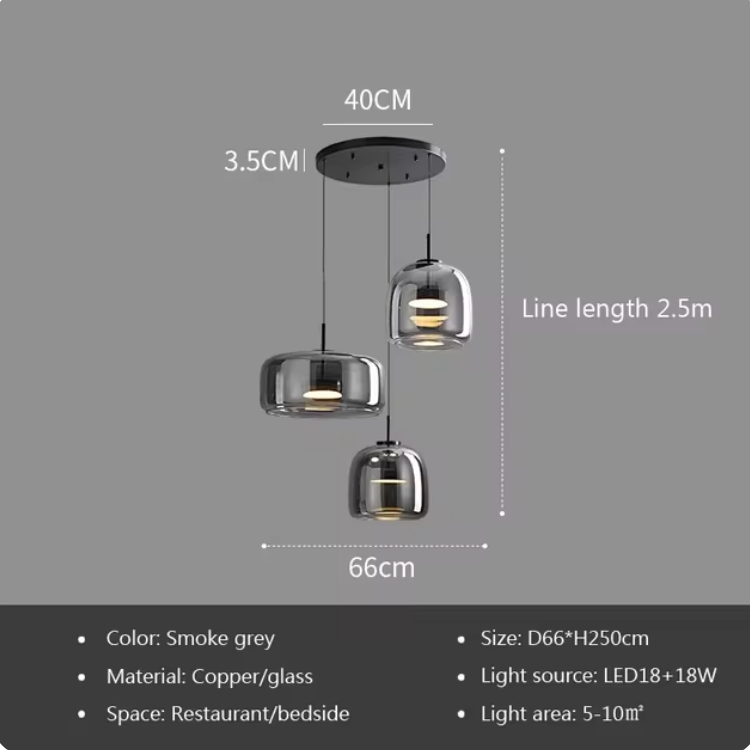 Astrid amber glass Nordic pendant light with gold fitting above a dining table