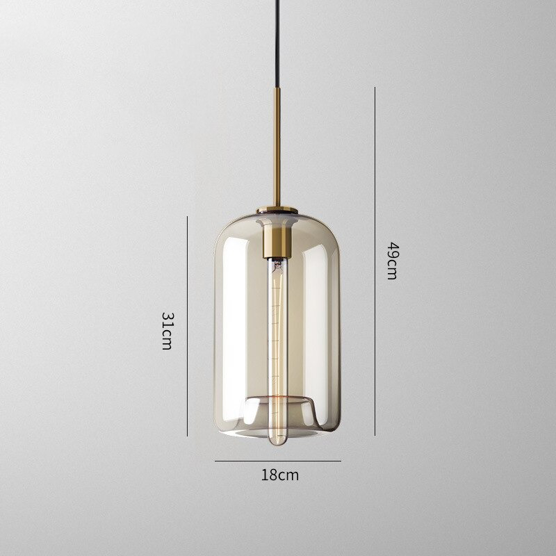 Millay cognac smoked glass pendant light in circle shape above a kitchen island