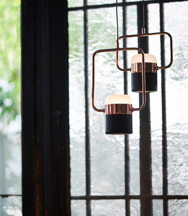La Scène 3-head Nordic LED chandelier in white hanging above a kitchen island
