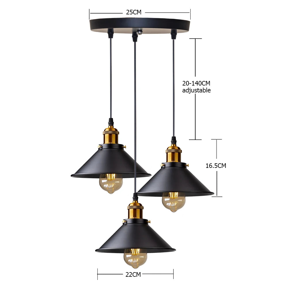 Camden vintage loft pendant light in black metal finish hanging above a kitchen dining table