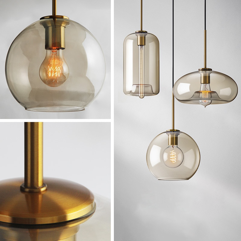 Millay cognac smoked glass pendant light in circle shape above a kitchen island