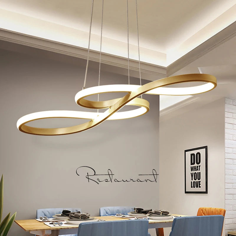 Islay dimmable LED kitchen pendant light in brushed gold above a marble kitchen island