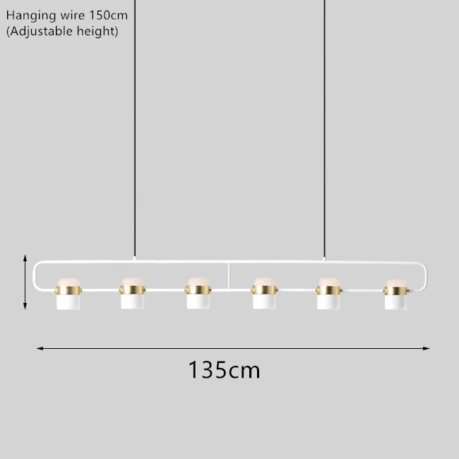 La Scène 3-head Nordic LED chandelier in white hanging above a kitchen island