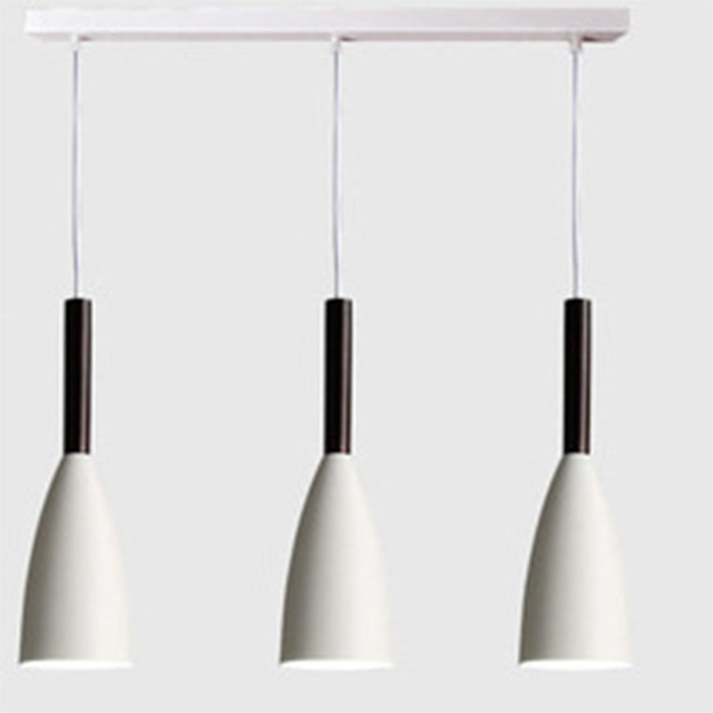 Trine triple aluminium pendant light in white above a kitchen island with adjustable cord lengths
