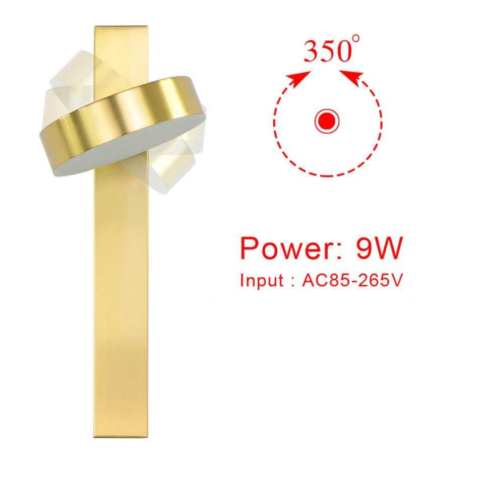 Lif gold rotating wall sconce angled upward for ambient lighting in a living room