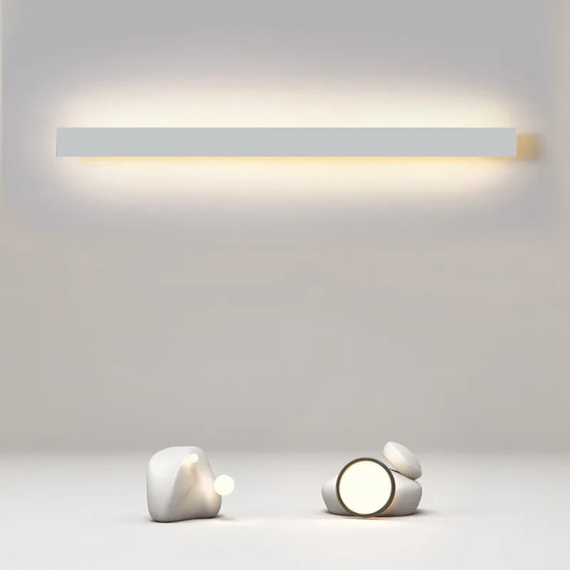 Simplicity minimalist white aluminium pendant light hanging in a Scandinavian living room