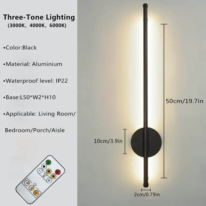 Volta magnetic rechargeable wall lamp in gold mounted in a hallway