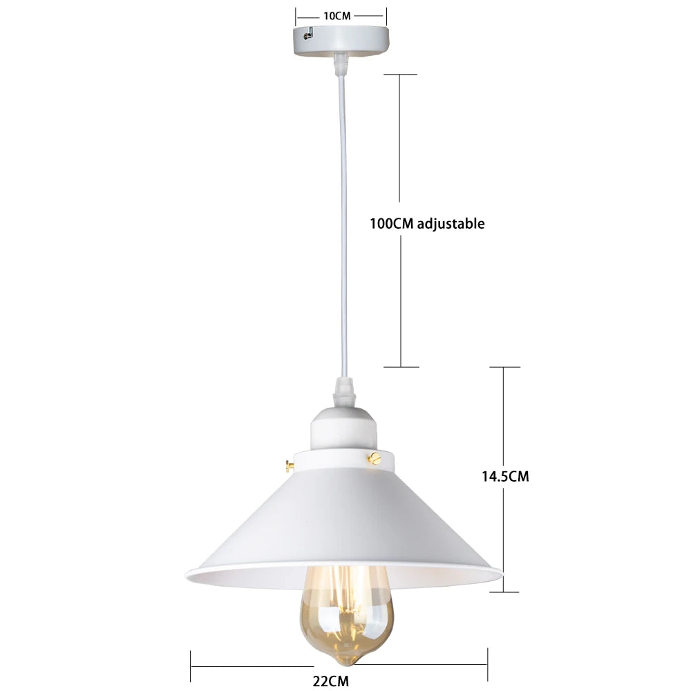 Camden vintage loft pendant light in black metal finish hanging above a kitchen dining table