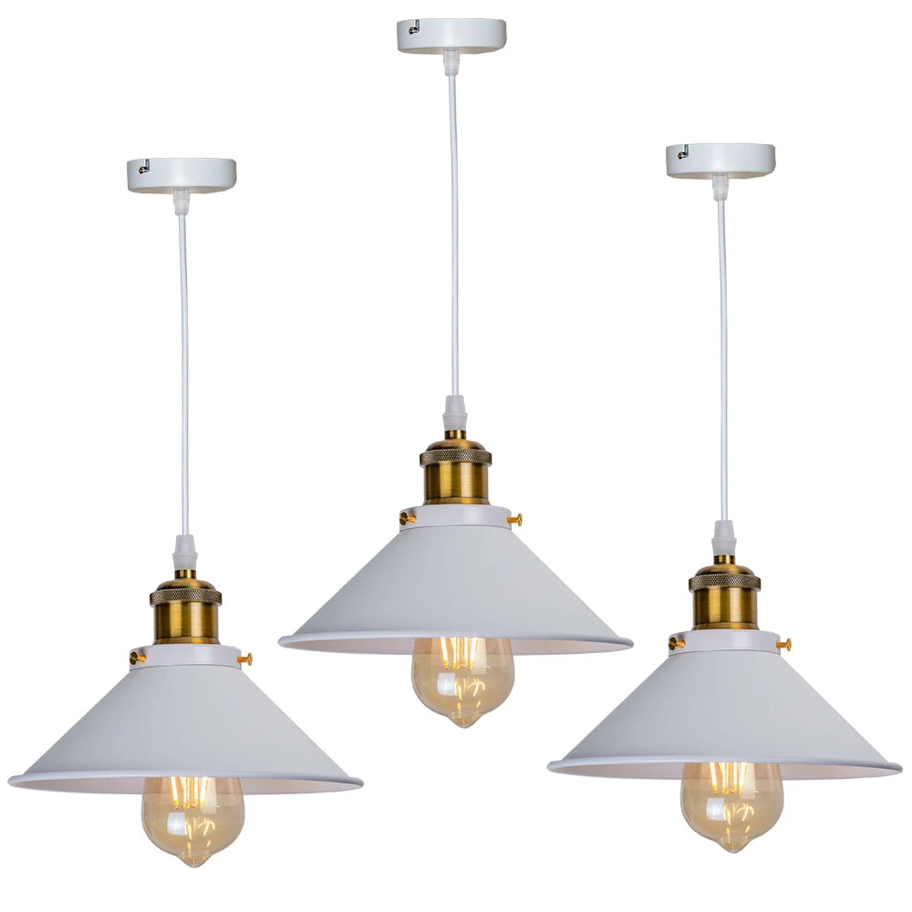 Camden vintage loft pendant light in black metal finish hanging above a kitchen dining table