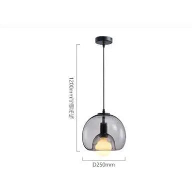 Anele smoke grey dome glass pendant light in a row of three above a kitchen island