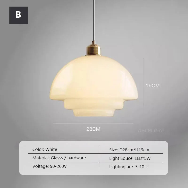 Opal milk glass pendant light hanging above a dining table, casting a soft warm glow