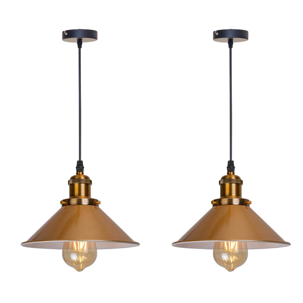 Camden vintage loft pendant light in black metal finish hanging above a kitchen dining table