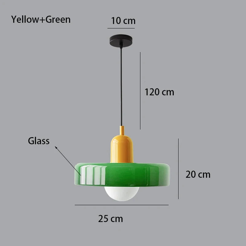Bauhaus multi-pendant glass chandelier with orange shades hanging above a dining table in a café