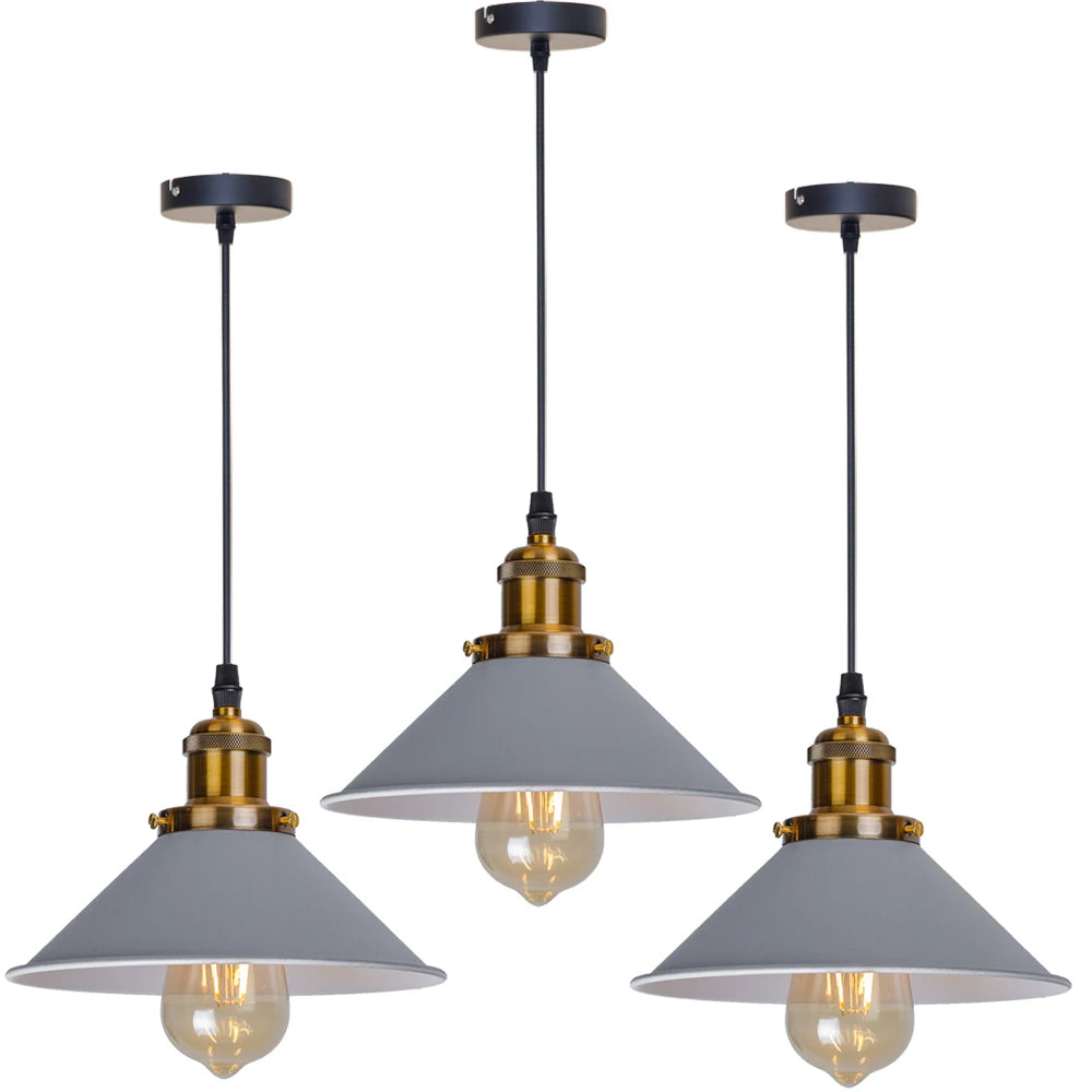 Camden vintage loft pendant light in black metal finish hanging above a kitchen dining table
