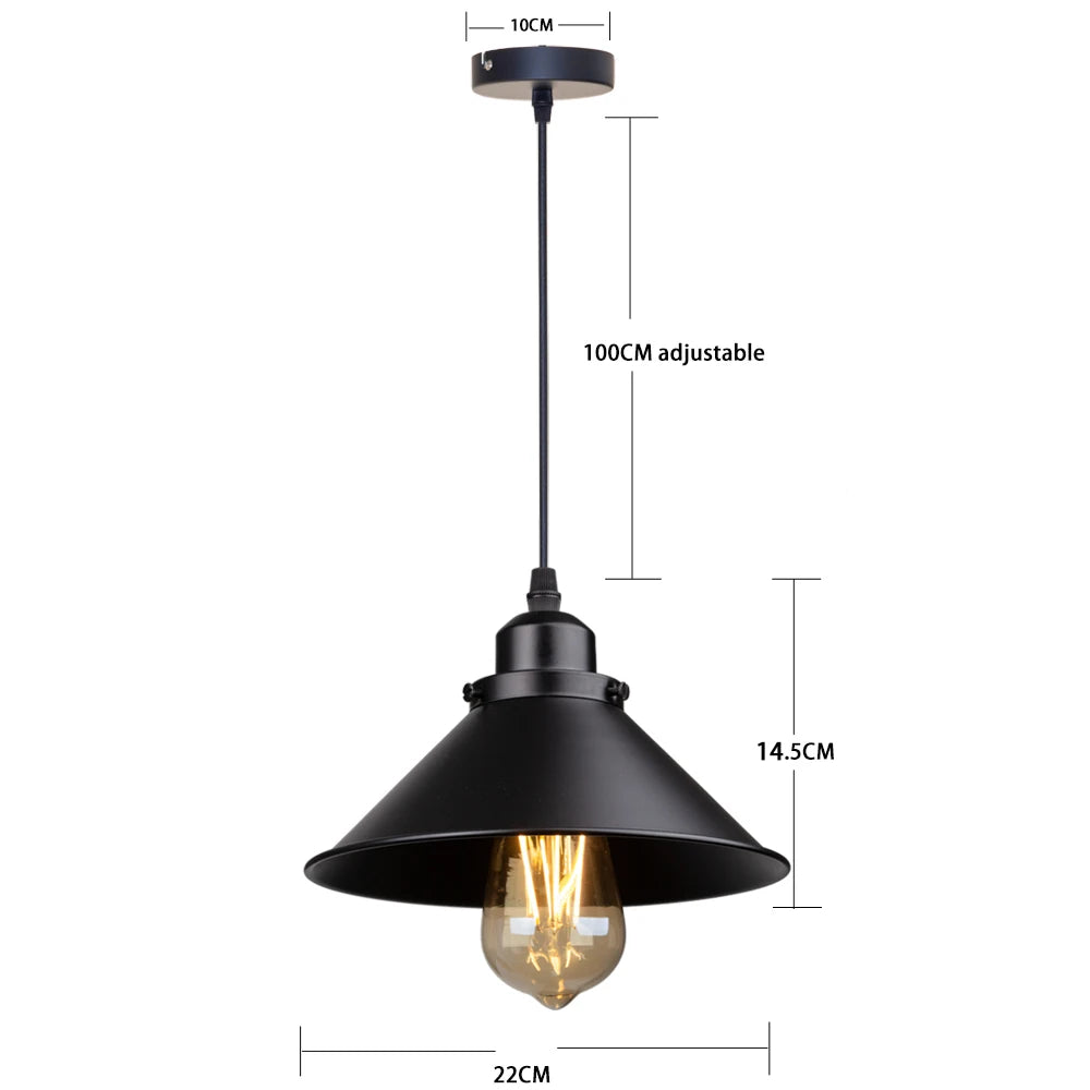 Camden vintage loft pendant light in black metal finish hanging above a kitchen dining table