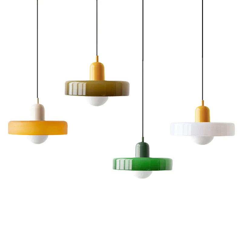 Kalle beige and white Bauhaus dual-tone glass pendant light hanging above a dining table