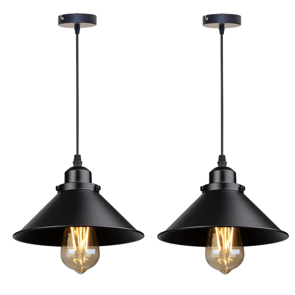 Camden vintage loft pendant light in black metal finish hanging above a kitchen dining table