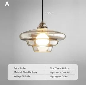 Opal milk glass pendant light hanging above a dining table, casting a soft warm glow